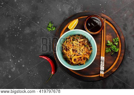 Traditional Asian Appetizer He Or Hwe, Squid Salad With Vegetables In A Bowl Top View Free Space For