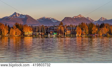 Anchorage, Alaska, Usa - 30 September 2016: Warm Colors Of Sunset At Spenard Lake In Anchorage. Smal