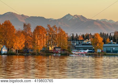 Anchorage, Alaska, Usa - 30 September 2016: Warm Colors Of Sunset At Spenard Lake In Anchorage. Smal