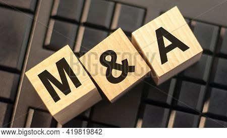 Word M And A Made With Wood Building Blocks, Stock Image