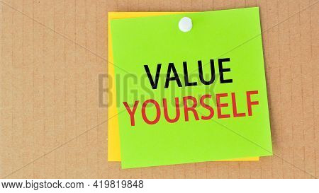 Value Yourself Written On Green Paper And Pinned On Corkboard, Concept