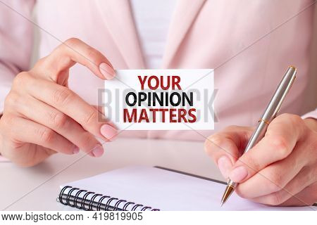 A Card In The Hands Of A Woman With The Inscription Your Opinion Matters, Concept