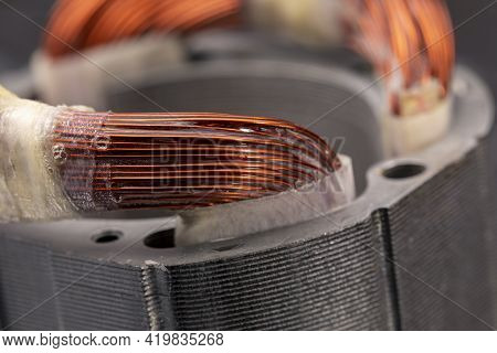 Stator Of An Electric Motor Close Up. Copper Motor Windings.