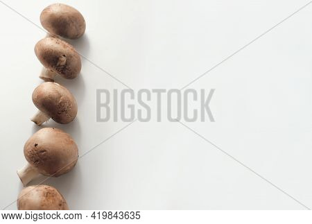 Fresh Mushrooms On A White Background. Selective Focus. Royal Champignons As Soup Ingredient. Tradit