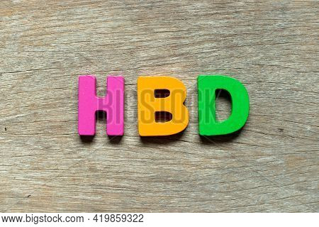 Color Alphabet Letter In Word Hbd (abbreviation Of Happy Birthday) On Wood Background