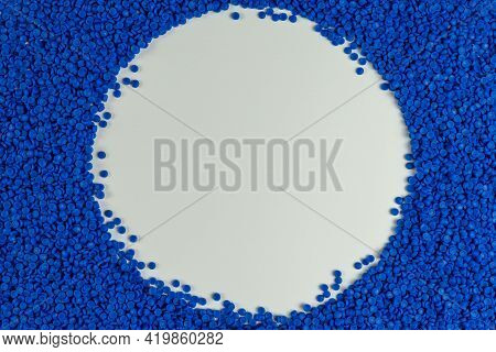 Plastic Beads On Green Gloved Hand. Polymer Beads. The World\'s Plastic Reduction Policy. Plastic On