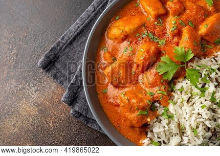 Chicken Paprikash With Basmati, Wild Rice In Juicy Paprika Sauce And Parsley.