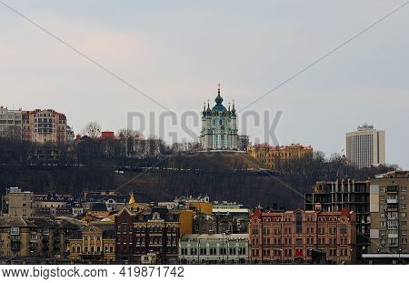 Scenic Landscape View Of Poshtova Square With Picturesque Historical Buildings. Embankment Of Dnipro