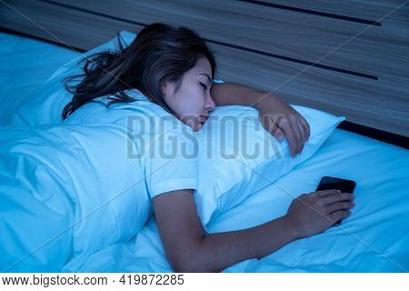 Young Woman Sleeping Cozily