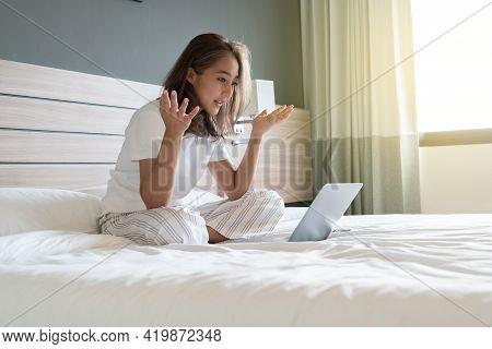 Women On The Bed With Laptop Video Conference Meeting