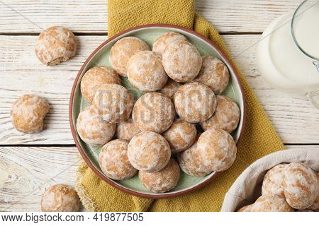 Tasty Homemade Gingerbread Cookies On White Wooden Table, Flat Lay
