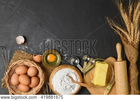 Bread Flour With Fresh Egg, Unsalted Butter And Accessories Bakery On Wood Background, Prepare For H