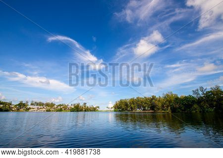 White Cloud And Blue Sky On Lake At Bang Tao Beach Phuket Thailand In Sunny Day Travel Time Concept.