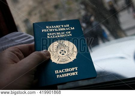 Azerbaijan, Baku - Nowember 2009: The Passport Of The Republic Of Kazakhstan Is Held By A Man. Natio