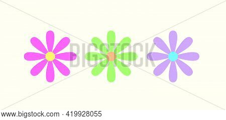 Three Daisy Flowers In Pastel Colors With A Light Background