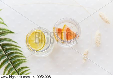 Handmade Summer Drinks With Tropical Flowers. Hard Seltzer With Lemon And Grapefruit. Homemade Summe