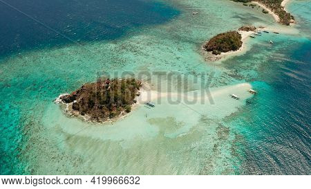 Aerial Seascape Tropical Island And Sand Beach, Turquoise Water And Coral Reef. Malacory Island, Phi