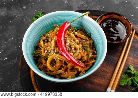 Traditional Asian Appetizer He Or Hwe, Squid Salad With Vegetables In A Bowl On The Wooden Board And