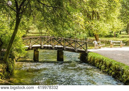 Wooden Bridge At The Source Of The River Bosna Near The City Of Sarajevo.