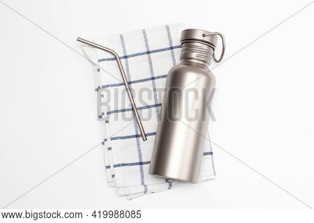 Titanium Hydration Bottle And Reusable Stainless Steel Straws. Zero Waste Concept