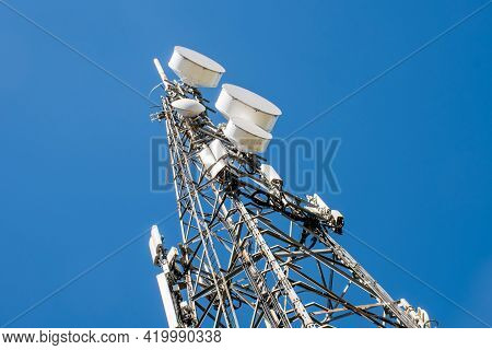 Radio, Communication And Cell Tower On Blue Sky Background