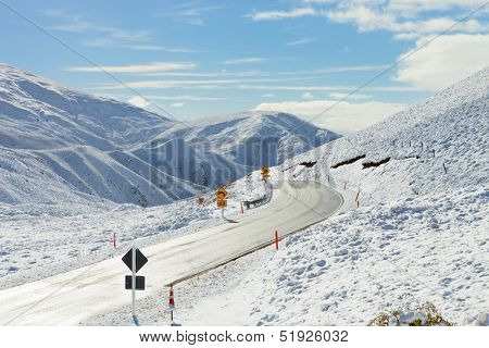 Road Through Snowy Mountains. Crown Range Road, South Island, New Zealand