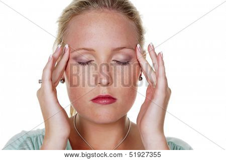 a young woman has headaches and migraines.