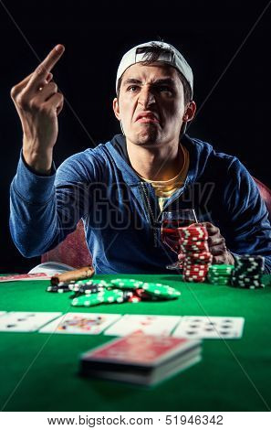 Agressive Young Gambler Indoors