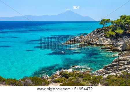 Rocky coastline and a beautiful clear water at Halkidiki Kassandra peninsula in Greece