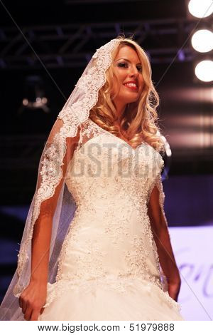 ZAGREB, CROATIA - OCTOBER 04: Fashion model wears dress made by Kontesa Nera on 'Wedding days' show, October 04, 2013 in Zagreb, Croatia.