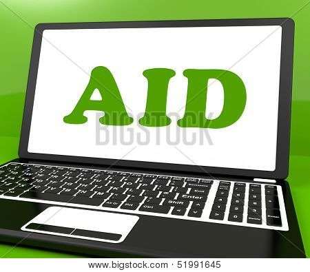 Aid On Laptop Shows Assisting Aiding Help Or Relief