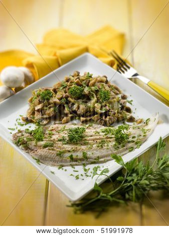 sole fish with sauteed mushroom, selective focus