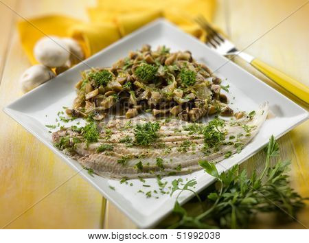 sole fish with sauteed mushroom, selective focus