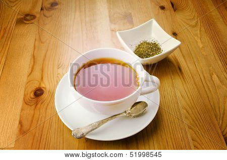 Cup of tea on wooden background