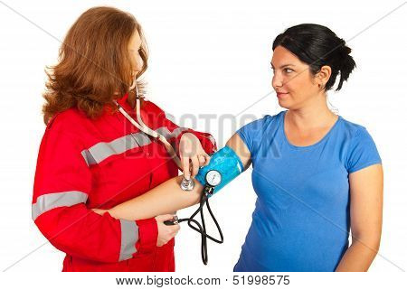 Paramedic Taking Blood Pressure