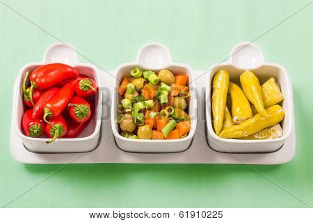 Chili sweet red and pickled green peppers