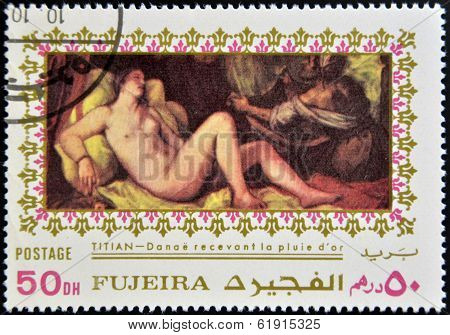 FUJEIRA - CIRCA 1985: Stamp printed in Fujeira shows Danae by Tintoretto circa 1985