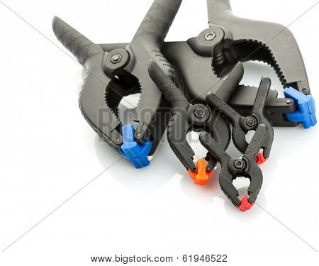 Plastic clamps on white background