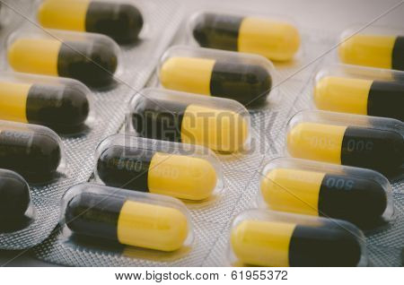 Black And Yellow Capsule