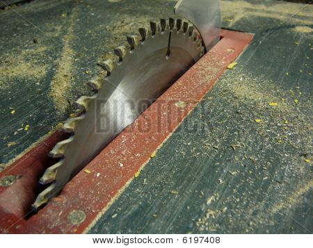 table saw with sawdust