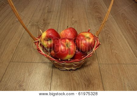 Red Apples In A Wicker Basket