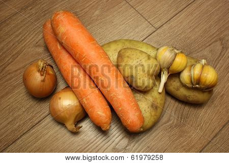 Fresh Vegetables On Wood Background
