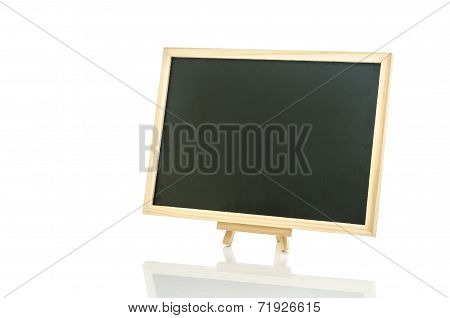 Black board and tripod on white background