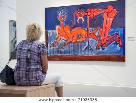 Woman looking at the picture