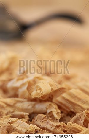 Chip Shavings with Spokeshave of Sapele Hardwood Board