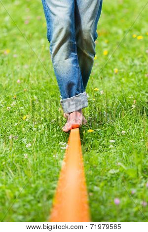 Slack line in the city park.