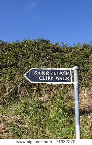 Cliff Walk Sign Beside The Cliffs