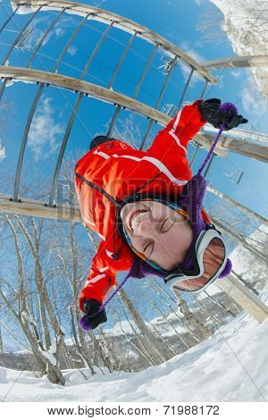 Hanging on the bars after skiing