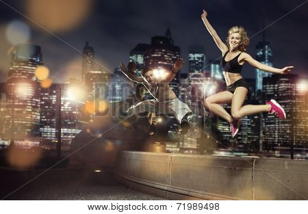 Fit couple in the city at night