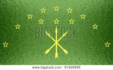 Adygea flag on metallic metal texture
